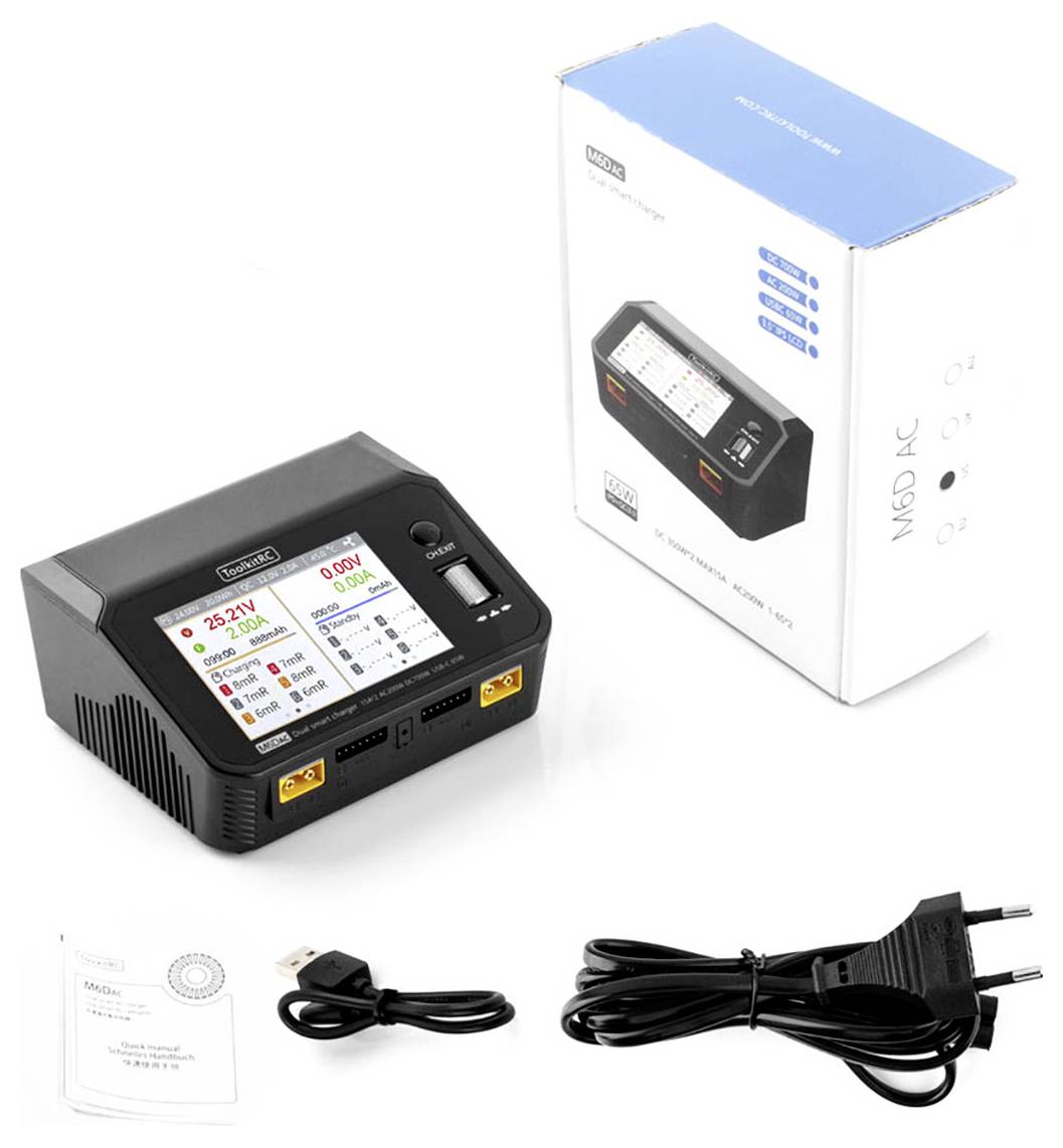 A black charger with a display shows charging information. Next to it is a box with printed details. Cables and instructions are included.