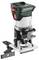 Electric router with green and black housing, red switch, and clear base, ideal for precise routing and woodworking.