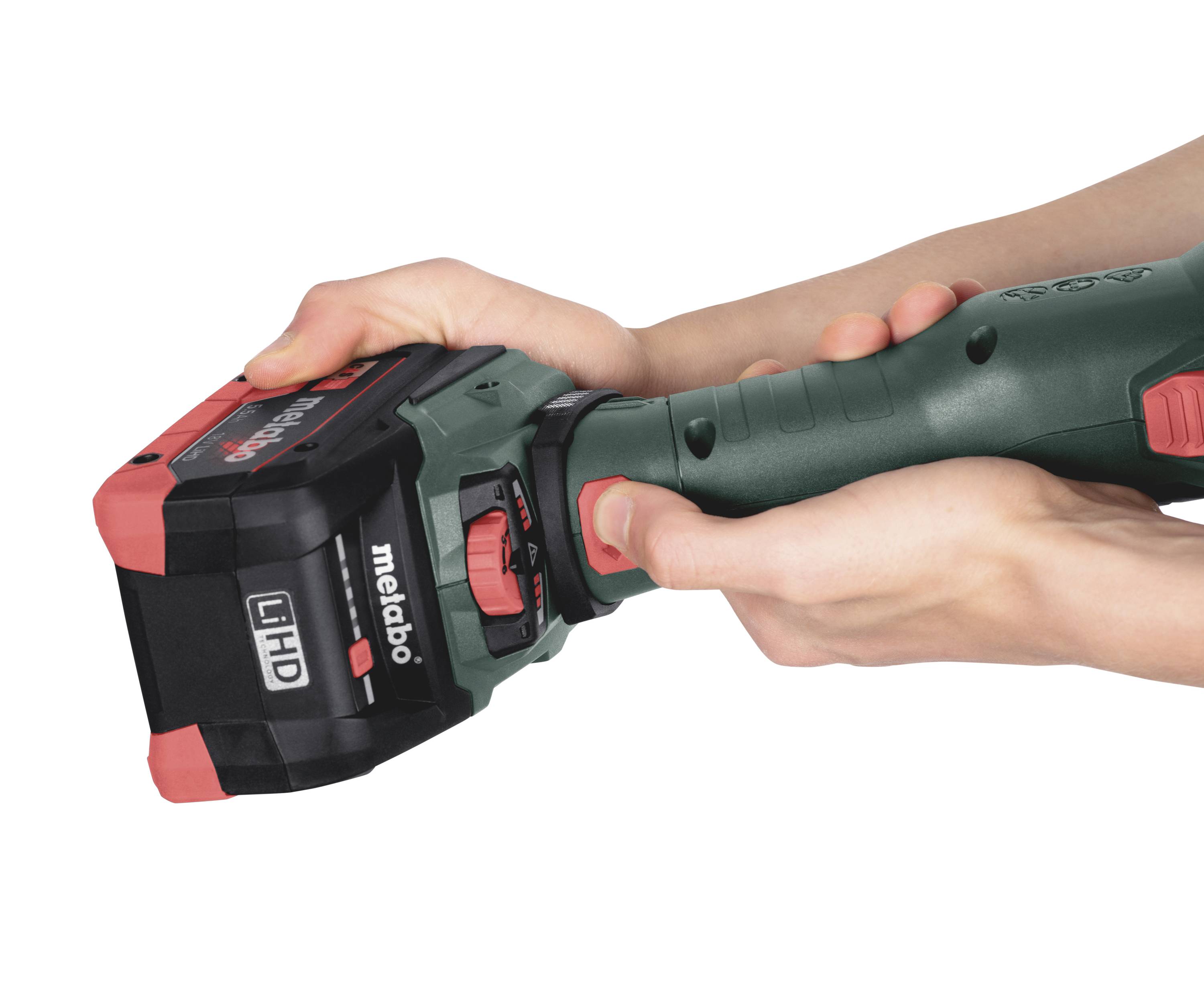A person holds a green cordless drill with a logo in close-up. The drill is being gripped by two hands.