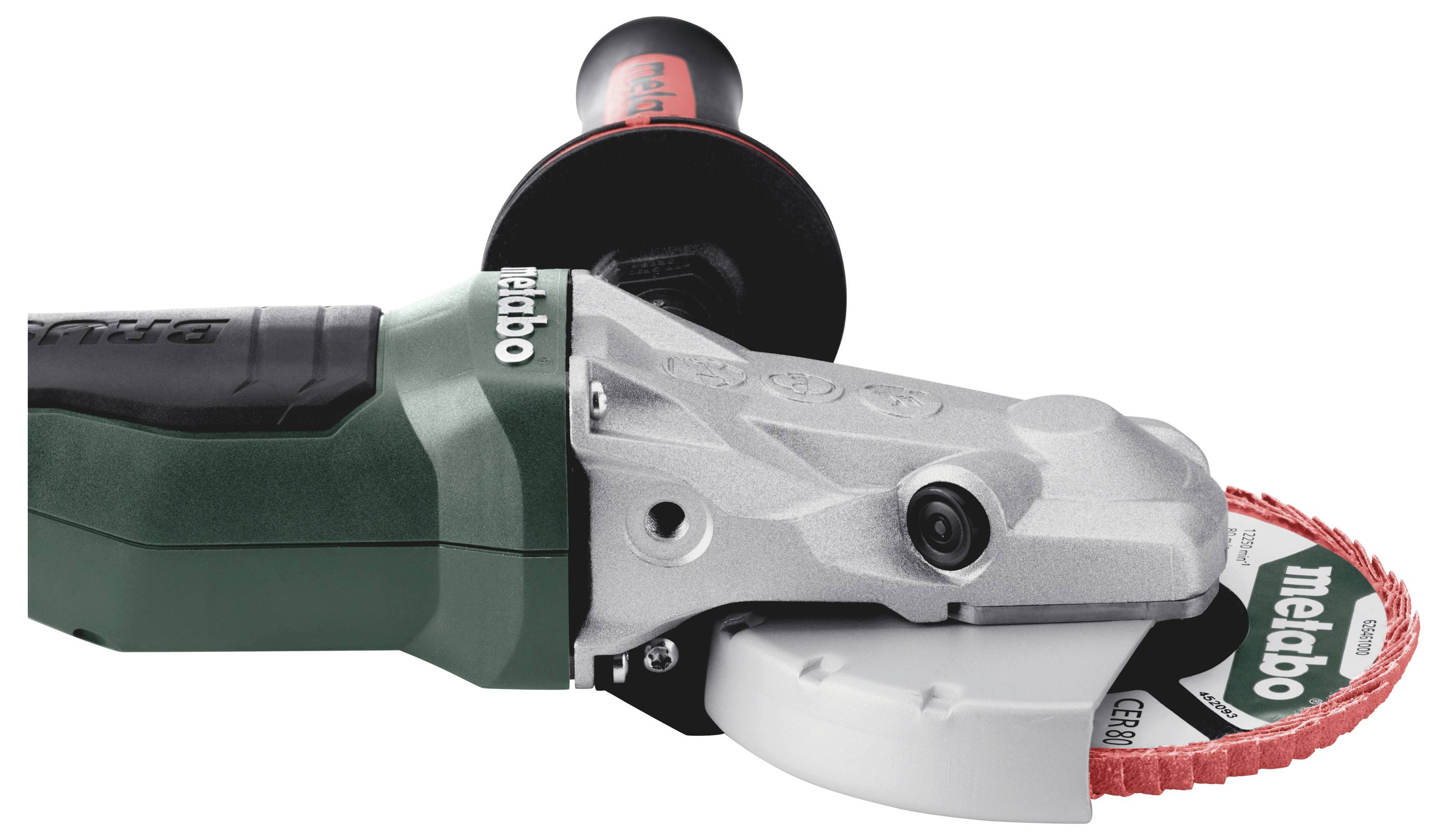 'Close-up of a green Metabo angle grinder with a red and black handle and a mounted grinding disc.'