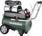 A mobile Metabo air compressor with two pressure gauges for use in workshops or for DIY projects.