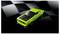 A bright green toy car with black details displayed against a dark, checkered background, resembling a race track finish line.