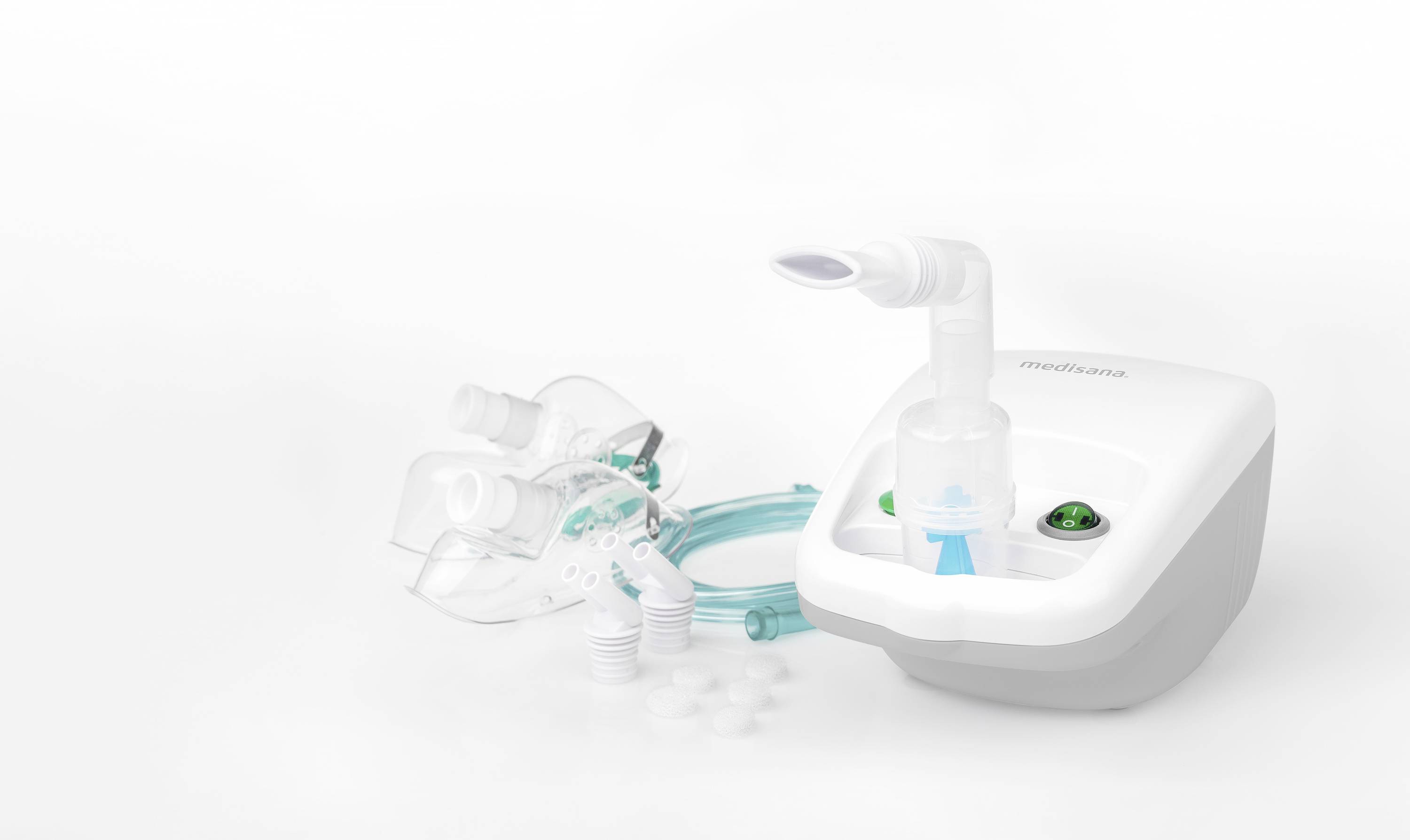 A portable nebuliser with a breathing mask, tubes and multiple mouthpieces, suitable for home inhalation therapy.