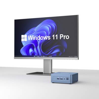 A monitor displays the start screen of 'Windows 11 Pro'. Next to it sits a small, blue PC with multiple ports on the front.