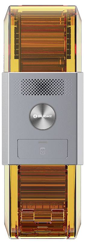 Compact device with a transparent, orange plastic casing and a silver button in the centre.