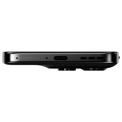 Black smartphone viewed from the side, with USB-C port, speaker grille, and SIM card slot visible.