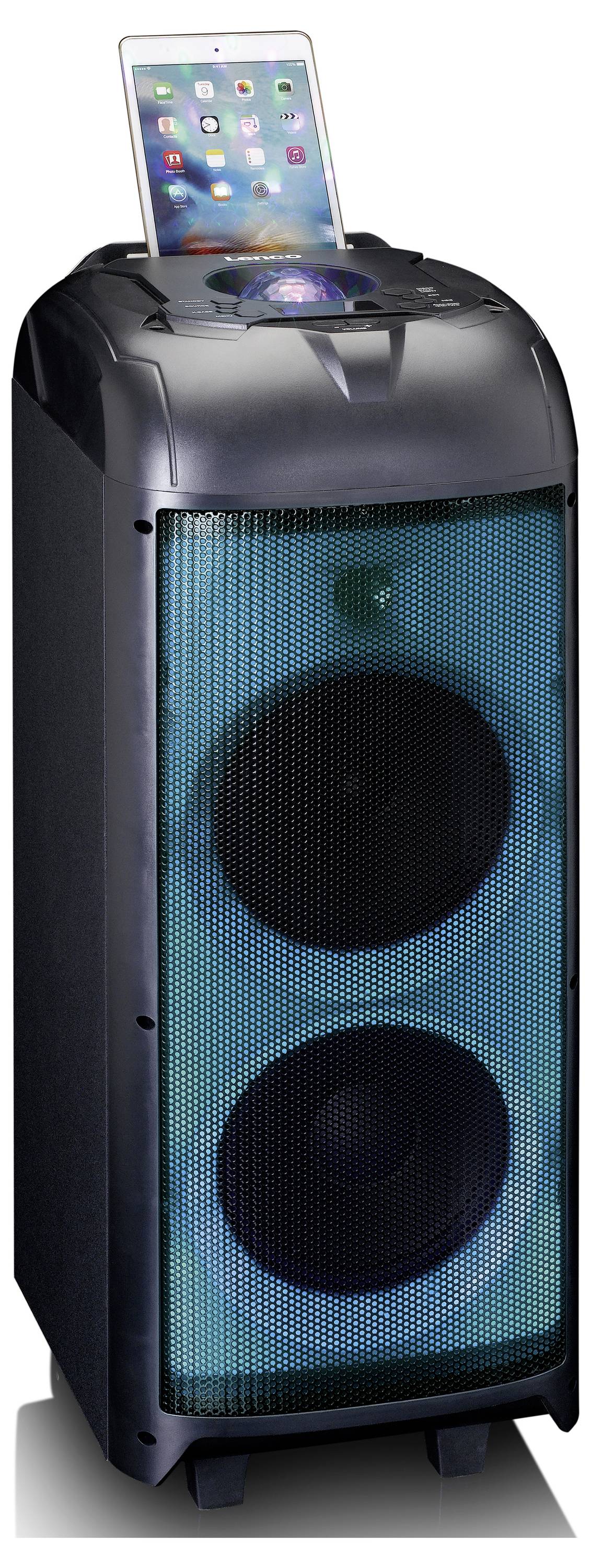 Black portable speaker with two large visible speakers, featuring a docking station for a tablet on top.