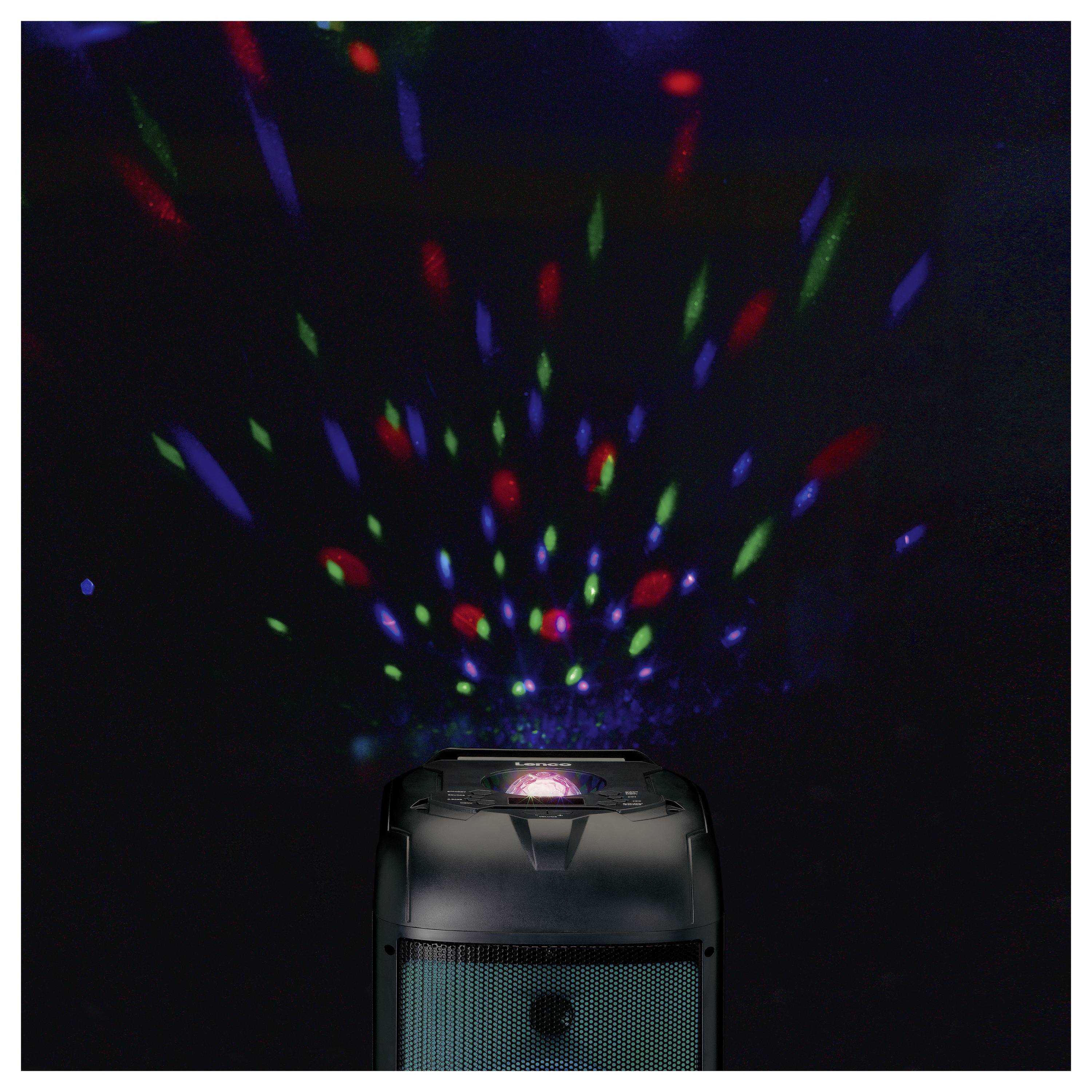 A speaker box with colourful light effects, projecting a pattern of red, green, and blue dots onto the ceiling and wall.