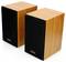 Two wooden loudspeakers with black front panels stand side by side. The Lenco logo is located in the bottom left.