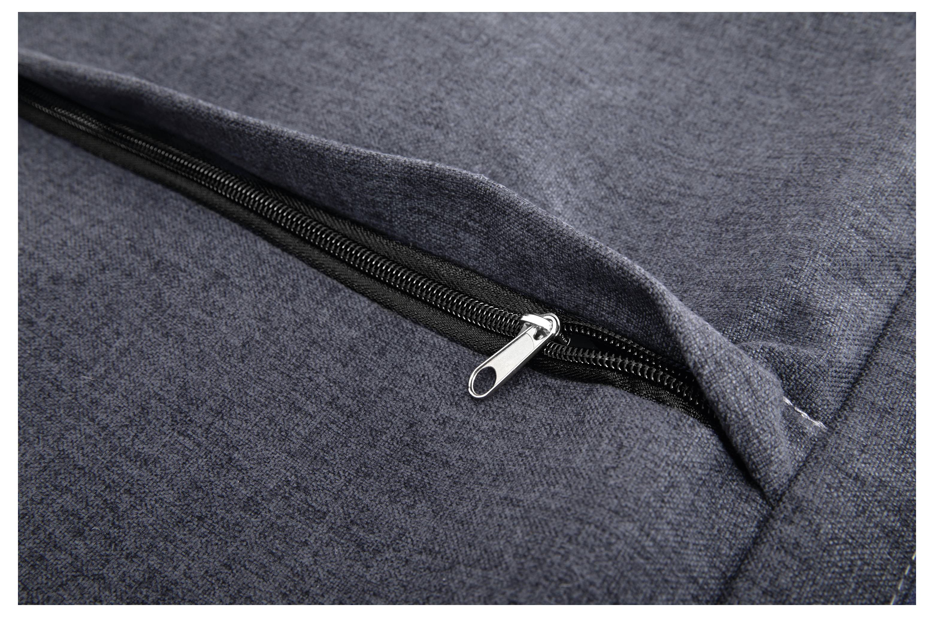 Zip of a grey fabric bag, slightly open.