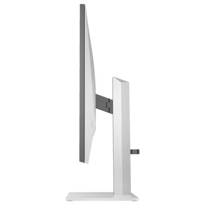 Side view of a modern computer monitor on a slim, adjustable stand.