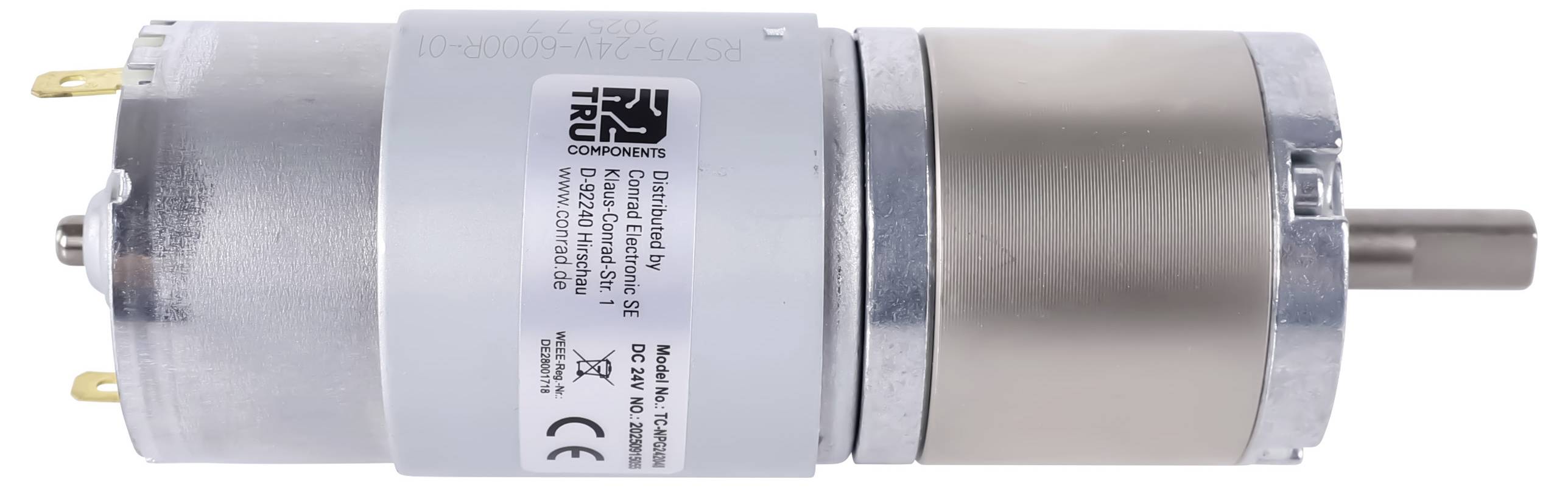 A cylindrical motor with a metallic finish, featuring a label with technical specifications and connectors on one end.