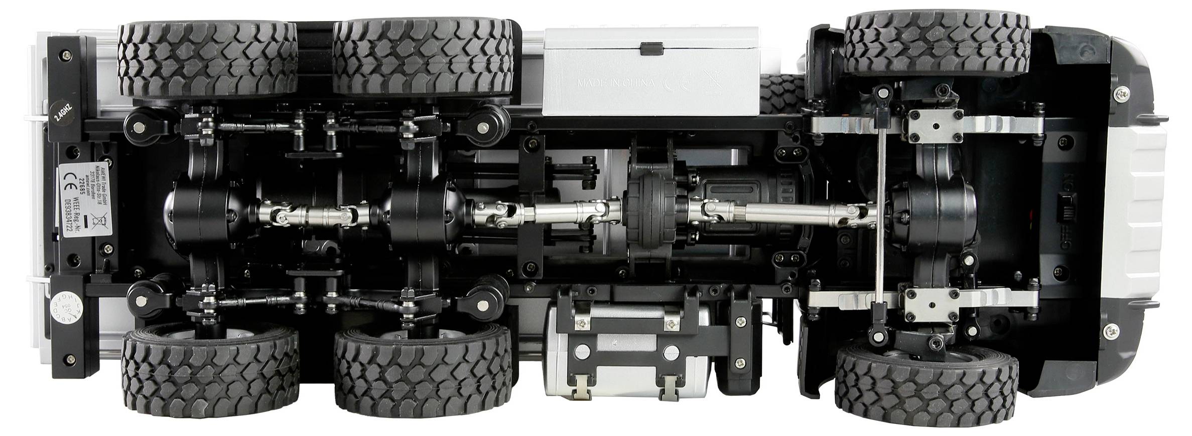 Illustration of a detailed lorry model shown from underneath to demonstrate the vehicle mechanics and wheel arrangement.