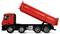 Red tipper lorry with tipped trailer and four axles.