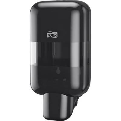 A black Tork soap dispenser, wall-mounted, used for the hygienic dispensing of liquid soap in public toilets.