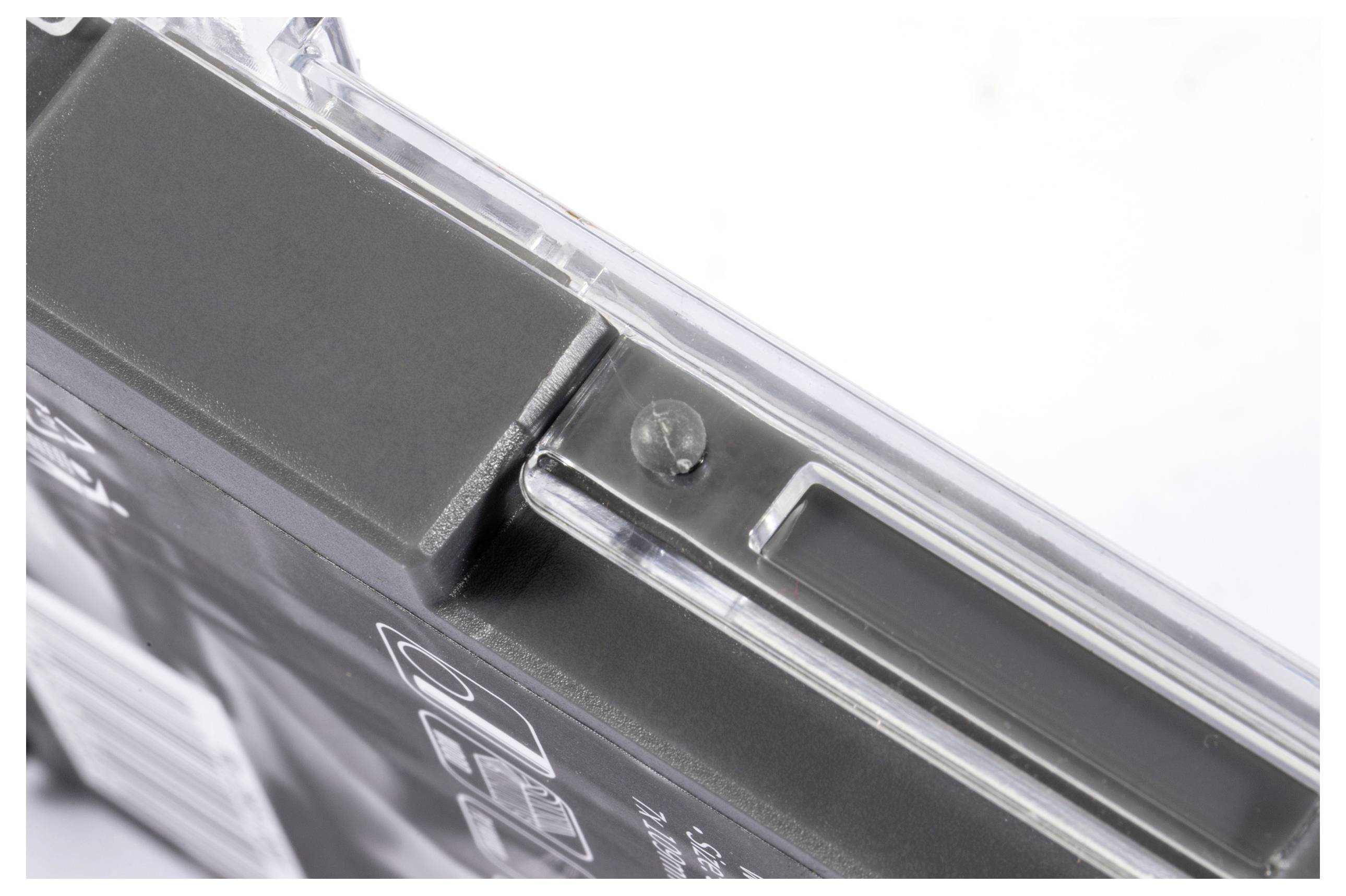 A close-up shot of a clear plastic CD case with the disc inside and visible spine.