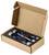 A cardboard box opened to display a foam insert holding a set of metal weights, possibly calibration tools, each piece secured in a custom cut-out.
