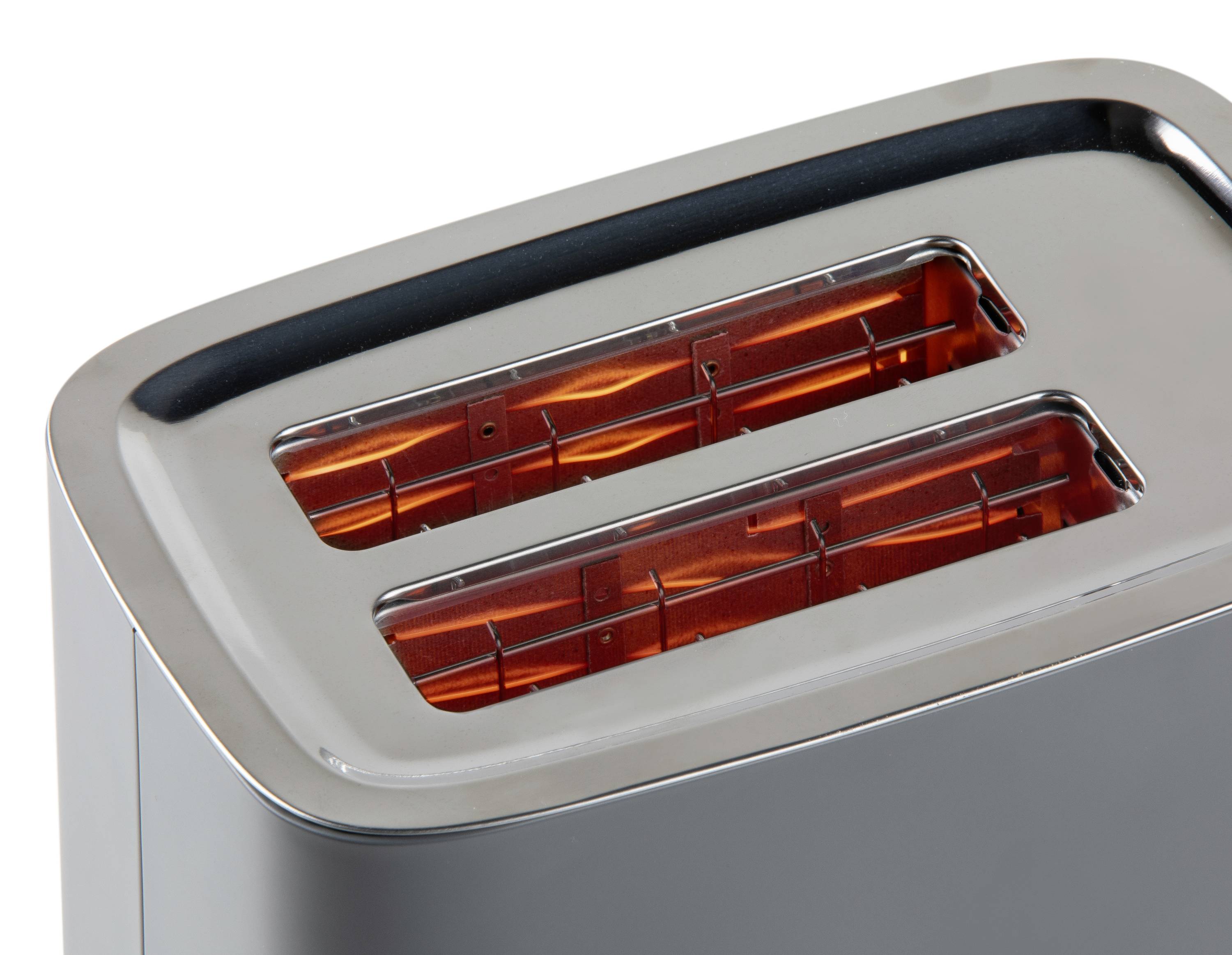 A stainless steel toaster with two slots, where glowing heating elements are visible.