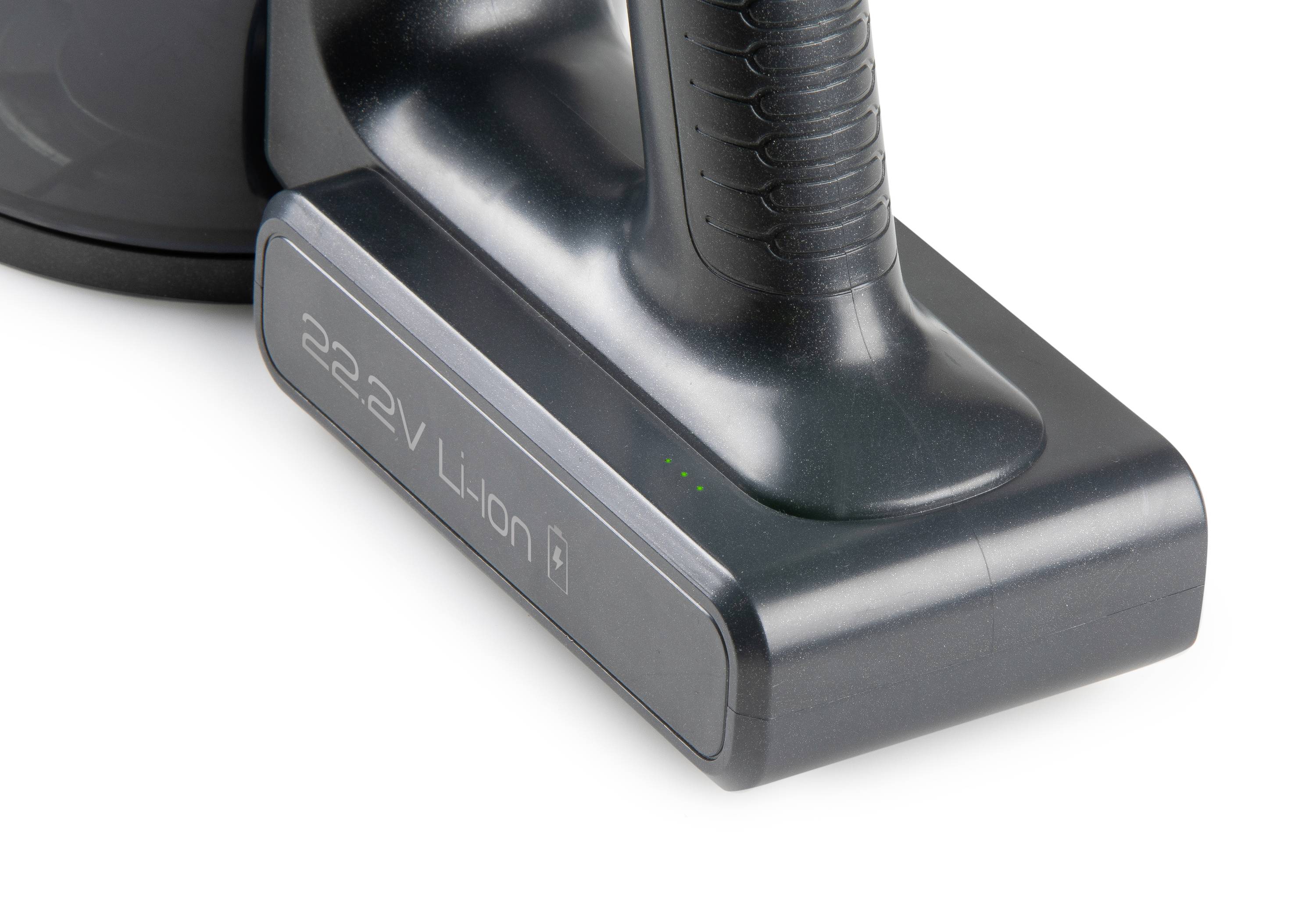 Close-up of a battery with the inscription '22.2V Li-ion'. The battery is part of a cordless device and shows the LED charging indicator.