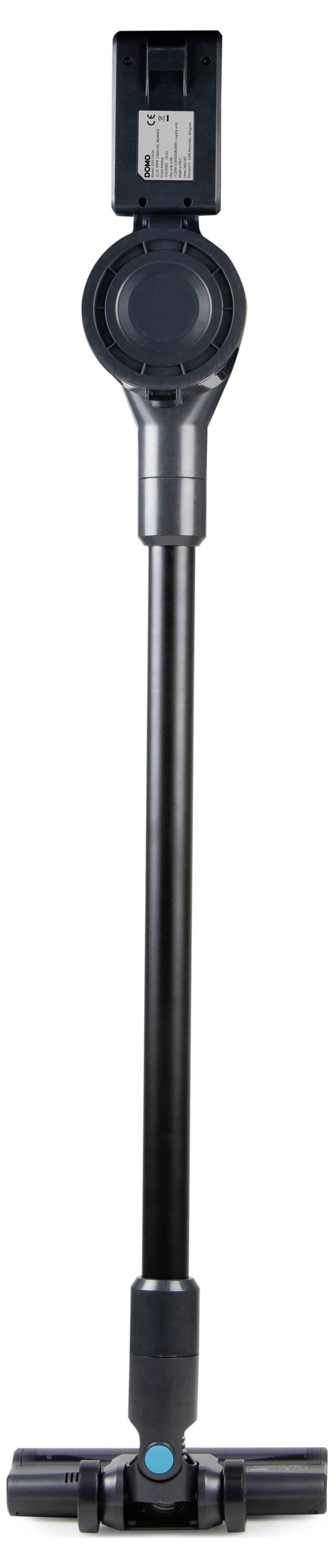 A black, cordless vacuum cleaner with a long handle and floor head, standing upright.