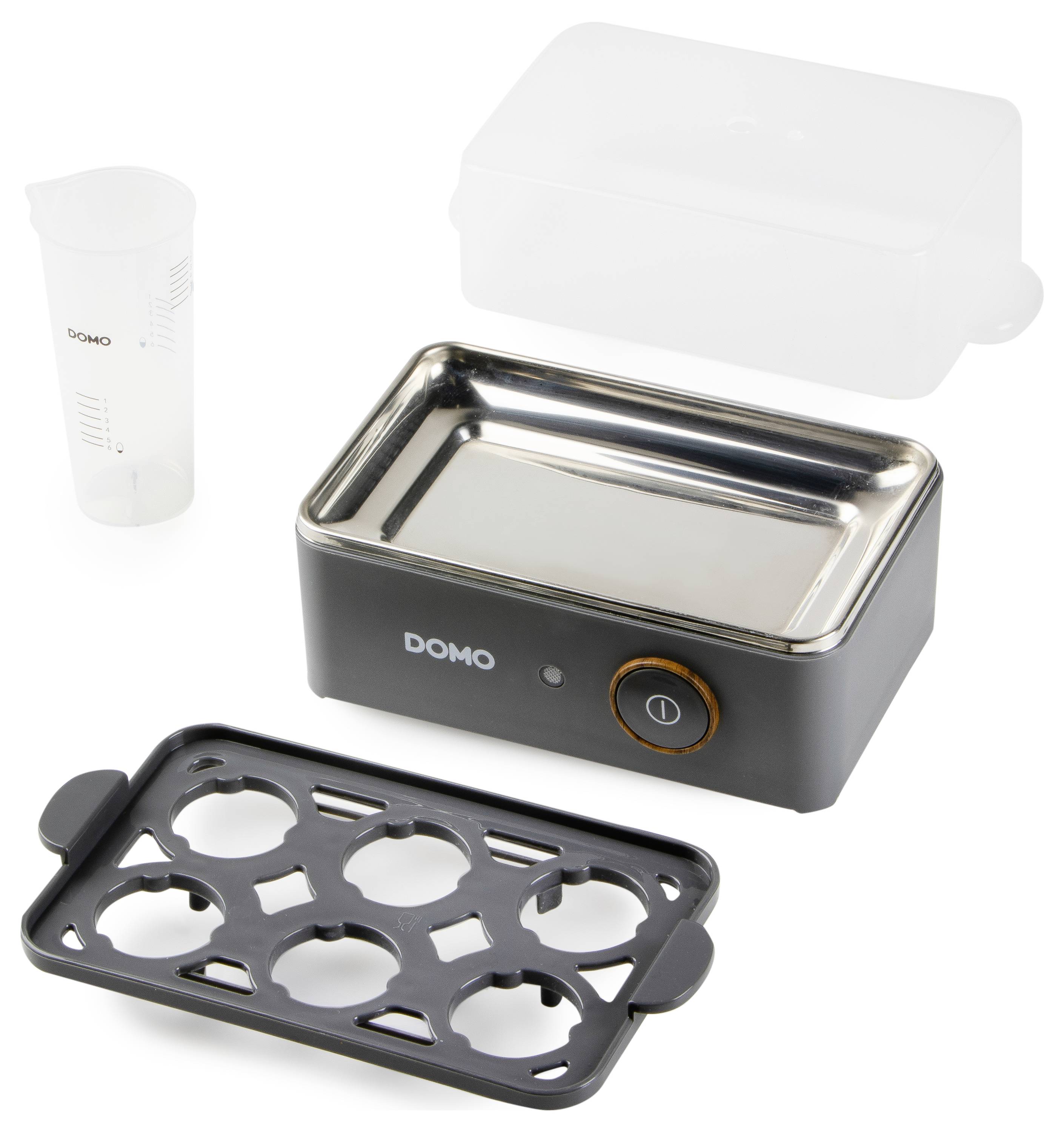 An egg cooker with a removable lid, water container, and egg holder for up to six eggs.