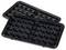 'Black waffle iron plates: Upper plate rests at an angle on the lower plate, showing square indentations for batter.'