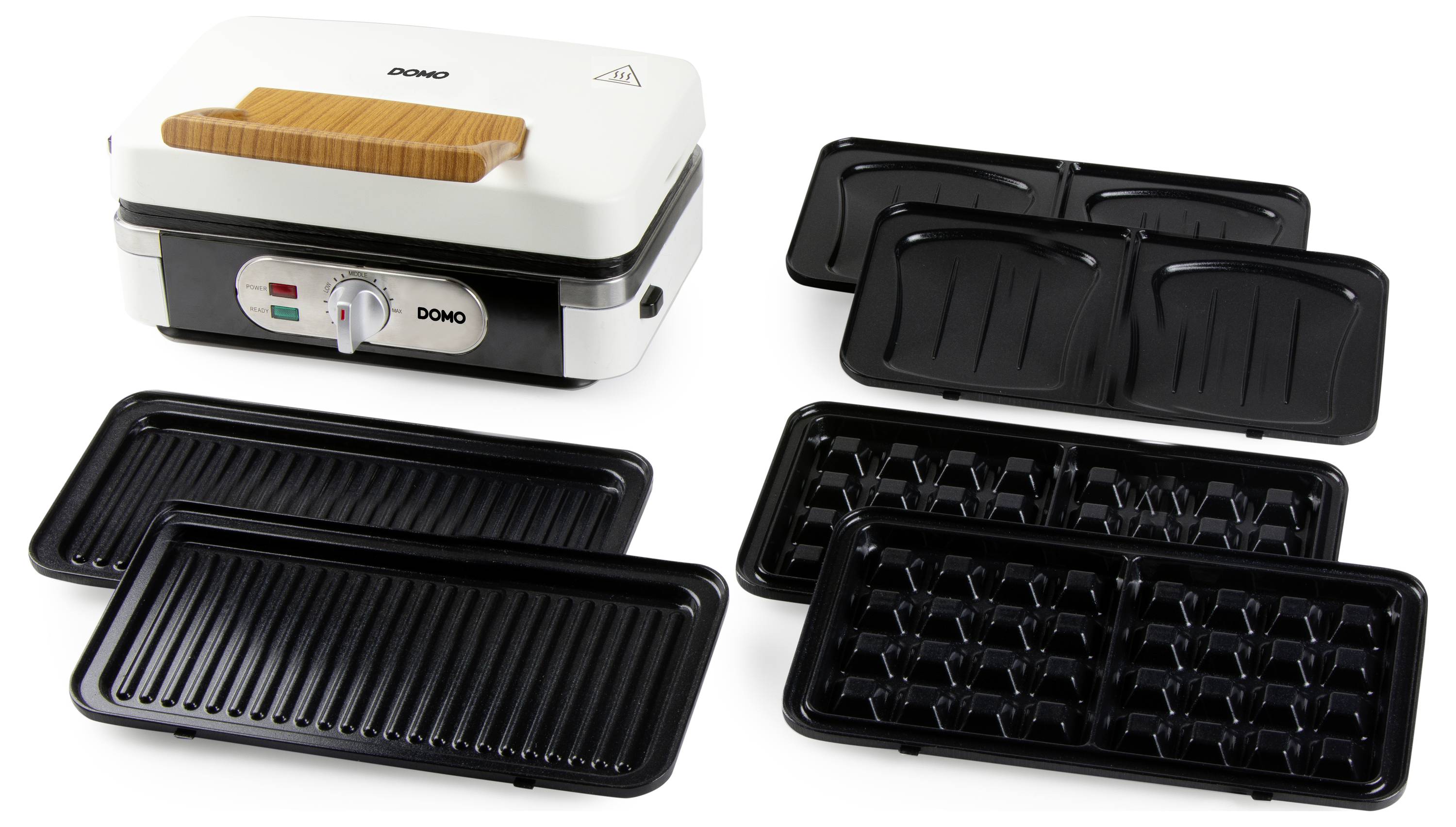 Waffle maker with interchangeable cooking plates: two for waffles, two for grilling and sandwich preparation.