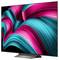 A large flat-screen TV displaying vibrant, abstract swirls of blue and pink on a black background, creating a dynamic visual effect.