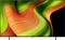 A television screen displays an abstract design of swirling green and orange lines, creating a dynamic and vibrant visual effect.