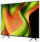 A vibrant green and orange abstract design on a flat-screen TV, showcasing the display's color clarity and modern aesthetics.