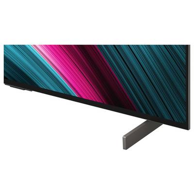 A modern flat-screen TV on a metallic stand, displaying vibrant diagonal stripes of blue and pink.