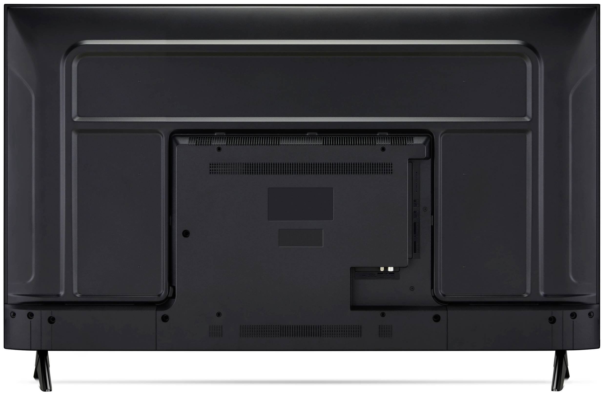 Back view of a television set showing ports and power connections, mounted on two stand legs, suitable for a living room setup.