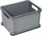 Grey plastic storage crate with side handles, rectangular shape, stackable. Suitable for transporting or storing items.