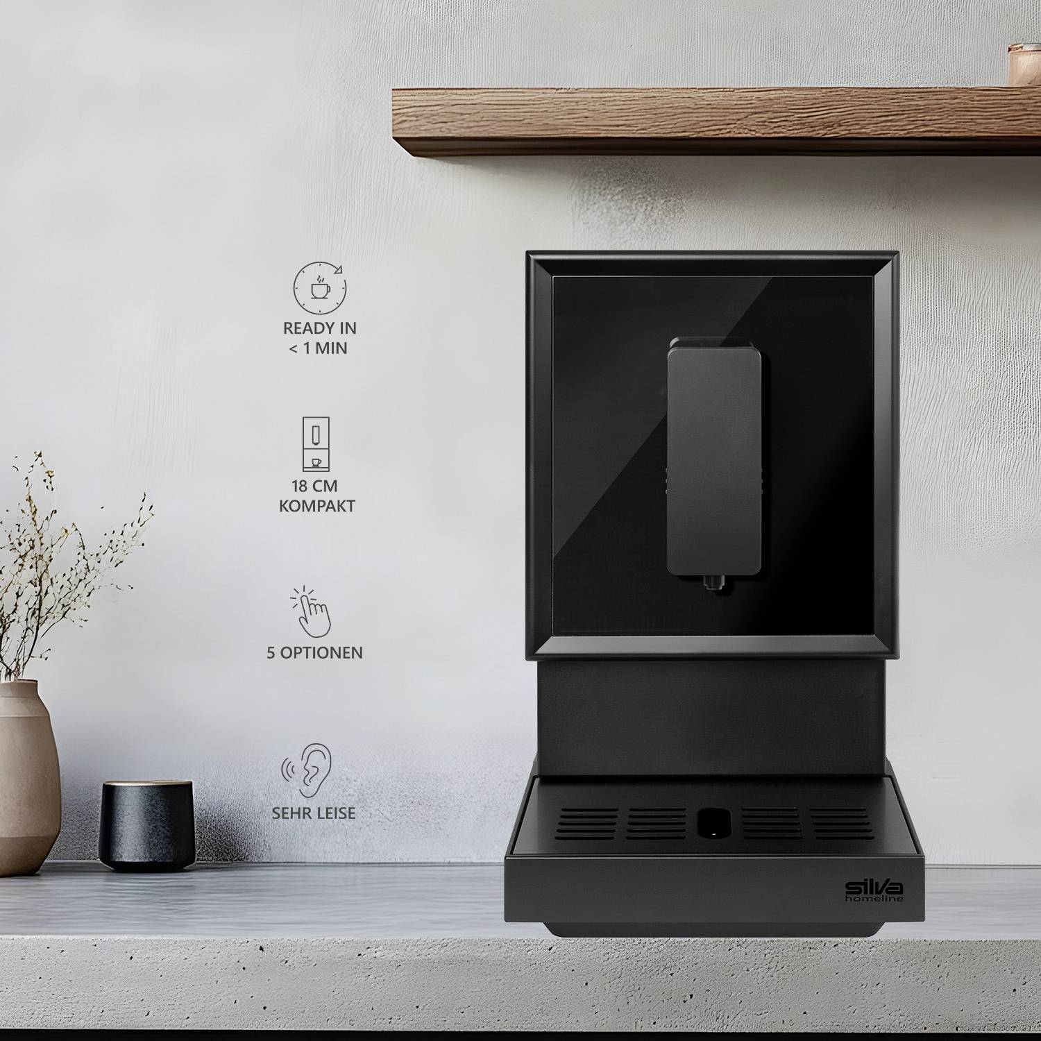 A black water dispenser on a grey worktop against a light grey wall. Left symbols: quick, compact, 5 options, quiet.