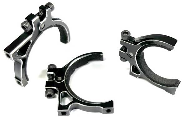 Three black metal clamps shown at different angles, with screws for mounting.