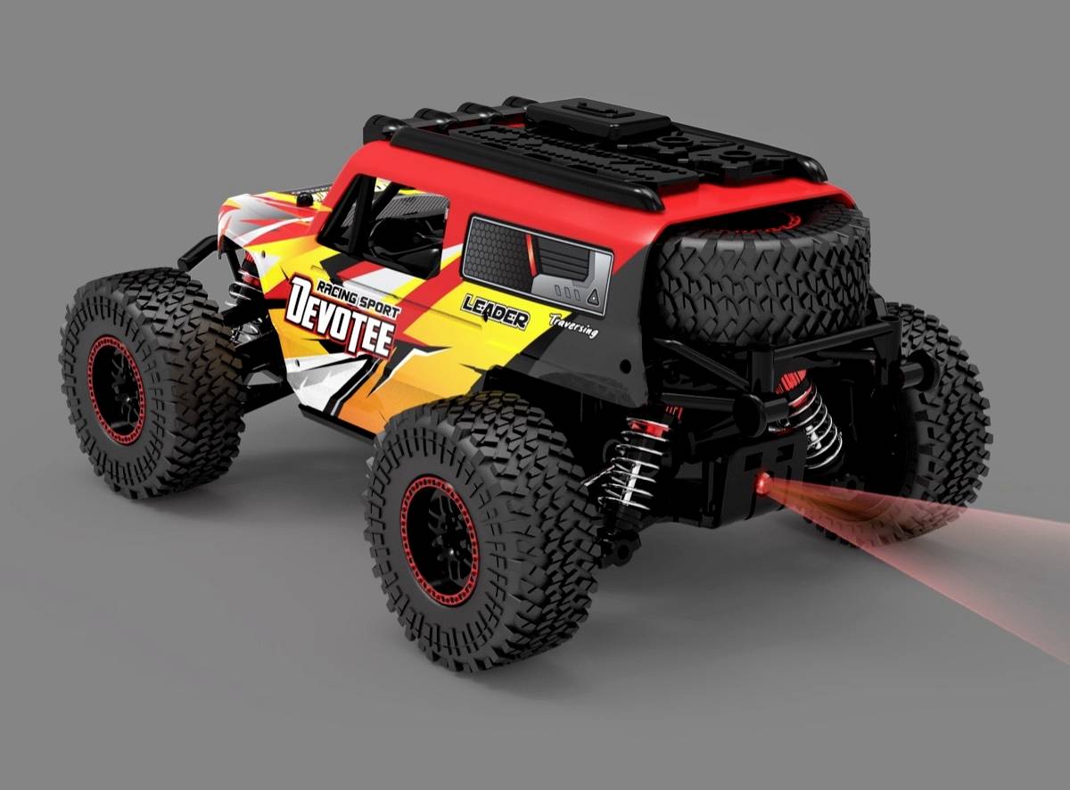 A remote-controlled car with robust tyres and a red-black design stands on a grey background. Rear lights glow red.