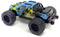 Remote-controlled car with blue and black bodywork, yellow star patterns, and large off-road tyres, viewed from behind.