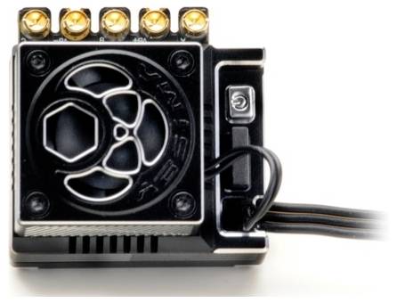 An electronic device with a black metal casing, fan, and golden screw terminals. Cable emerges from the right side of the housing.