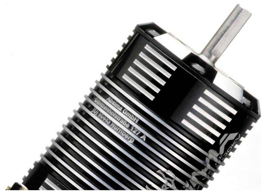 A black electric motor with silver lamellae and an axial rotor from manufacturer ABOMA Ltd.