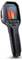 Hand thermometer with thermal display showing temperature of '1719°F'. Black device with ergonomic grip, brand logo visible.