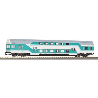 A two-storey railway carriage in turquoise and white colours on a railway track.