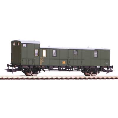 A green goods wagon of the Deutsche Reichsbahn on a railway track, side view, with detailed chassis and small windows.