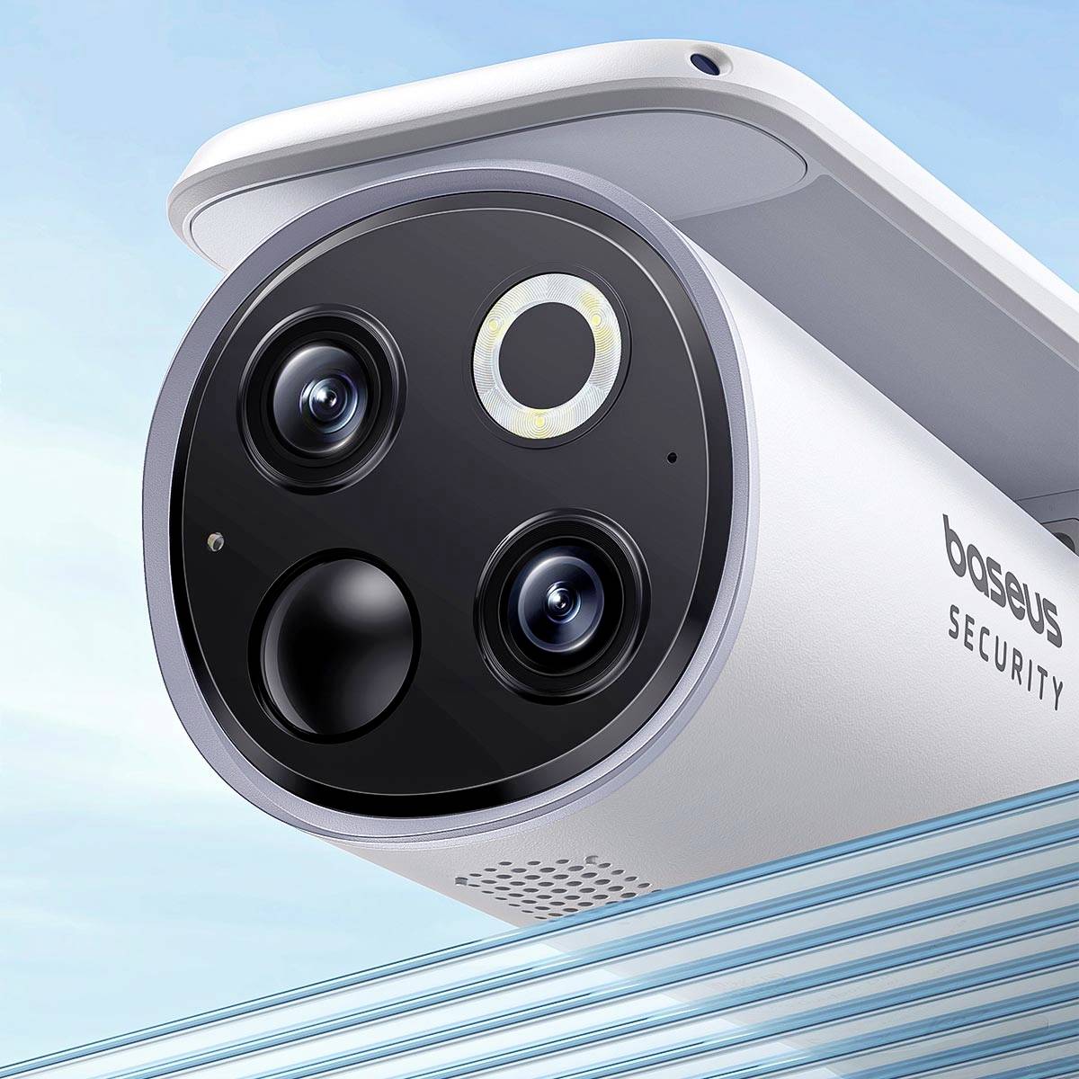 A white Baseus security camera with two lenses and a microphone, installed beneath a blue sky.