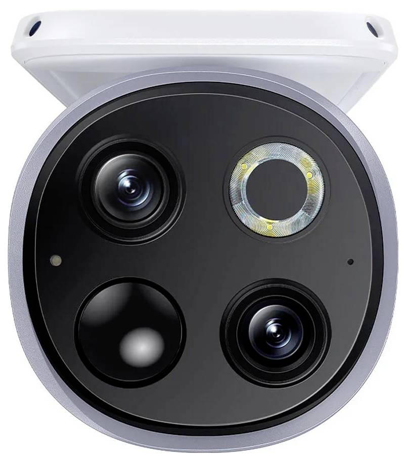 Front view of a round surveillance camera with four lenses in a white housing.