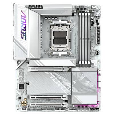 A silver-coloured motherboard with an 'Aorus' logo, multiple RAM slots, CPU socket, and expansion slots visible.