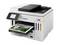 A white multifunction printer is printing a colour photograph. A display shows printing options. Brand name on the device.