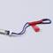 Climbing Equipment: A silver wedge with a blue sling and red carabiner.