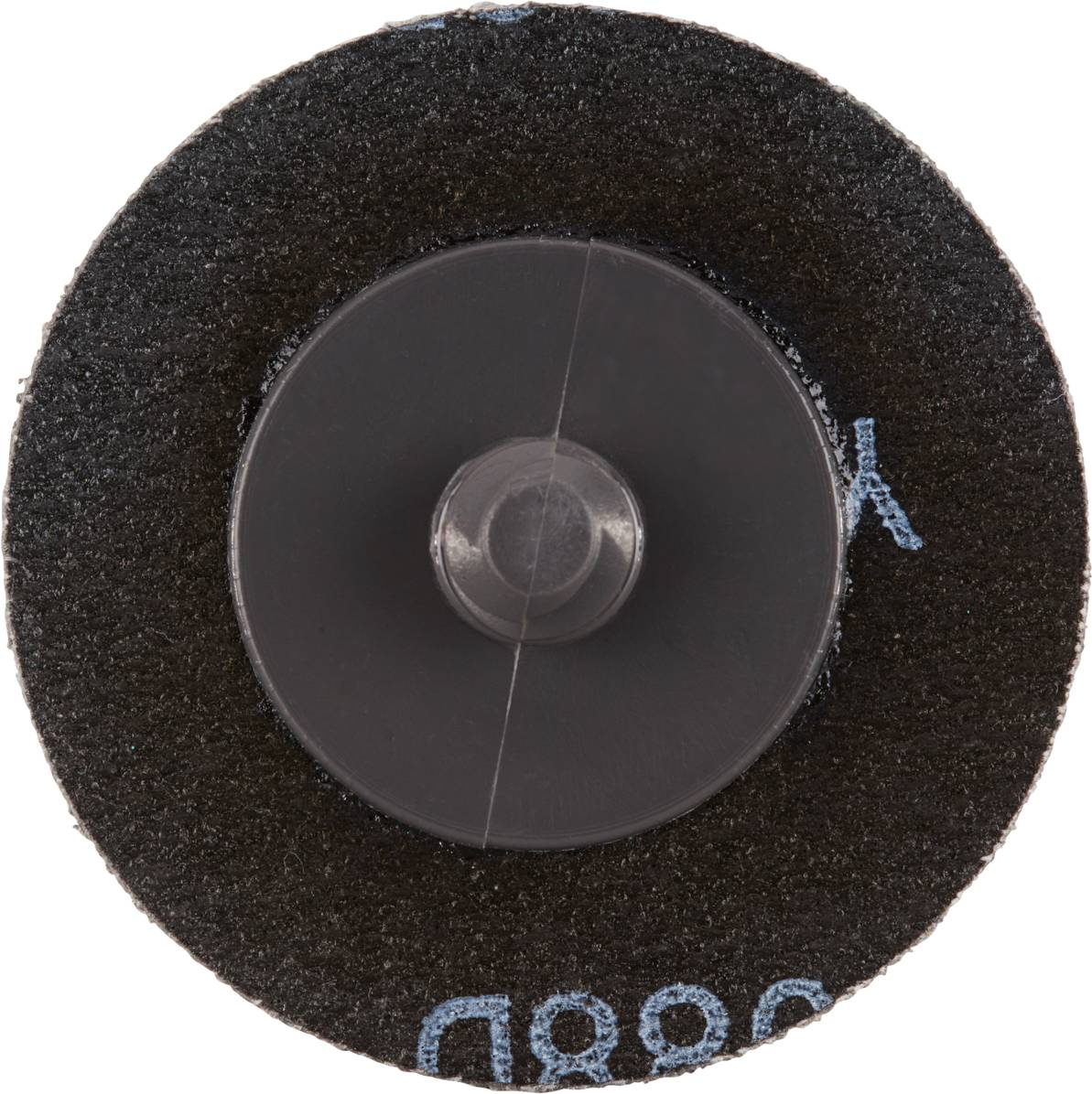 A round grinding disc with a black surface and transparent plastic core.