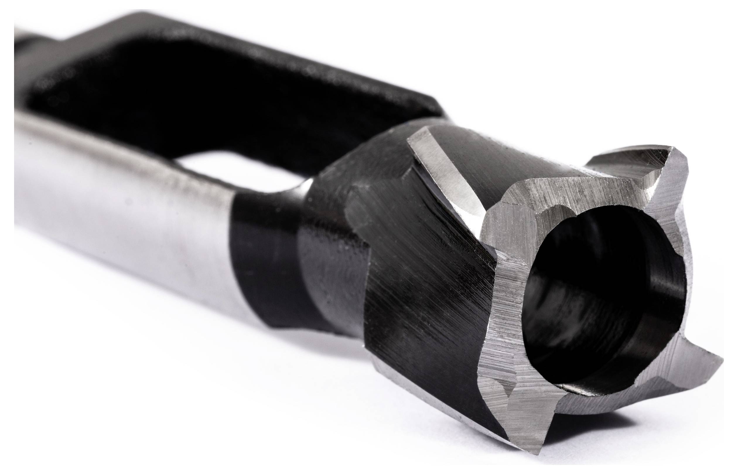 A close-up image of a metal tool with a sharp, multi-edged cutting head, used for reaming or enlarging holes in materials.