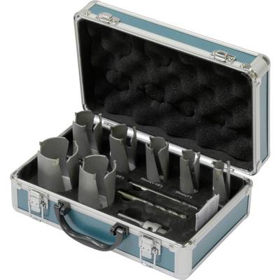 An open aluminium case with foam lining contains several crown drill bits of various sizes along with a hand tool.